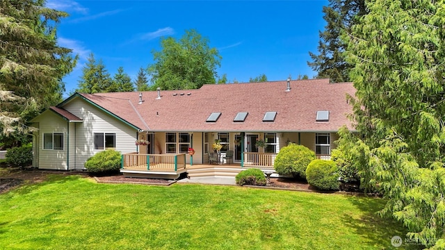 8368 Birdsview Meadows Ln, Concrete, WA 98237 - back of house featuring a yard, a shingled roof, and a deck