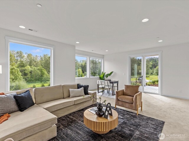 667 17th Ave NW, Issaquah, WA 98027 - living room with recessed lighting, light carpet, and baseboards
