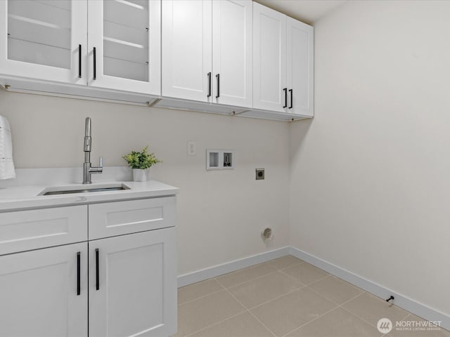 667 17th Ave NW, Issaquah, WA 98027 - washroom with cabinet space, baseboards, washer hookup, electric dryer hookup, and light tile patterned floors