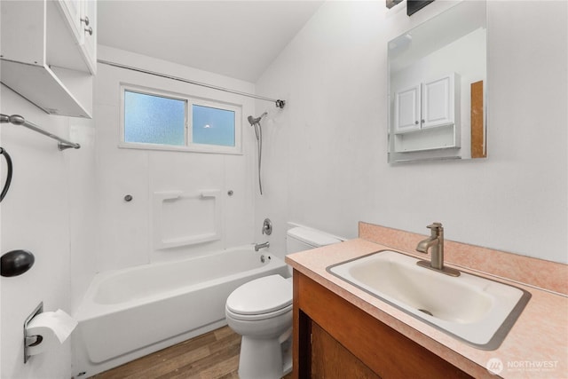 21813 223rd Pl SE, Maple Valley, WA 98038 - full bathroom featuring toilet, wood finished floors, shower / bathtub combination, and vanity