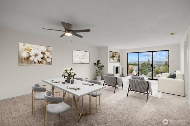 3425 Colby Ave Unit 502, Everett, WA 98201 - dining space with carpet and a ceiling fan