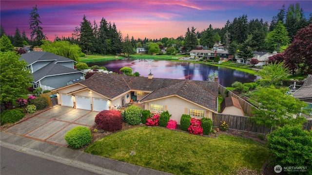 view of subject property with a nearby body of water