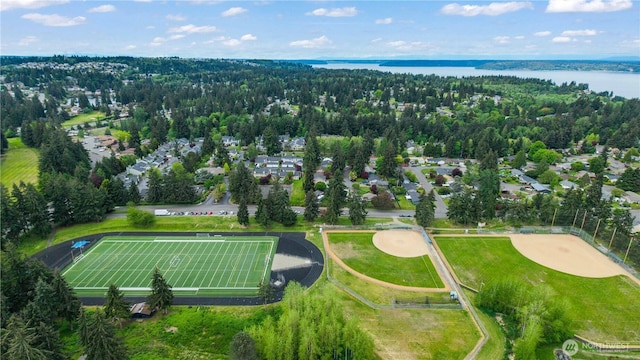 aerial overview of property's location featuring a nearby body of water