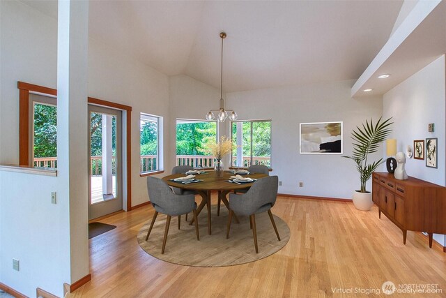 55 Langell Ln, Orcas Island, WA 98245 - dining space with light wood finished floors, baseboards, recessed lighting, a chandelier, and lofted ceiling