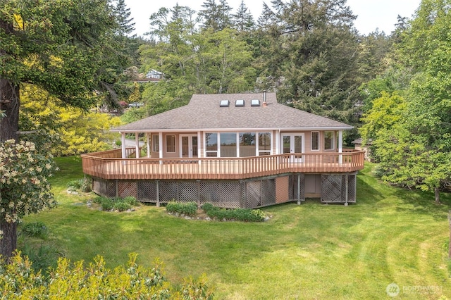 55 Langell Ln, Orcas Island, WA 98245 - rear view of property featuring a shingled roof, a lawn, a wooden deck, and a wooded view