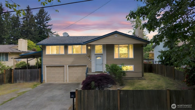 14502 Main St, Bellevue, WA 98007 - raised ranch featuring driveway, a garage, and fence