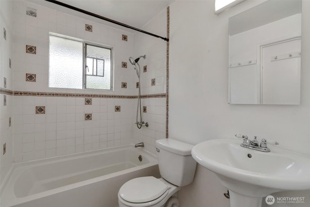 14502 Main St, Bellevue, WA 98007 - bathroom featuring toilet, shower / washtub combination, and a sink