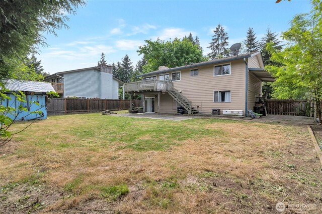 14502 Main St, Bellevue, WA 98007 - rear view of house featuring a patio, a deck, and stairway