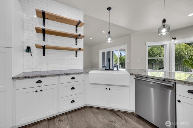13800 27th Dr NW, Tulalip, WA 98271 - kitchen featuring stainless steel dishwasher, a sink, open shelves, healthy amount of natural light, and vaulted ceiling