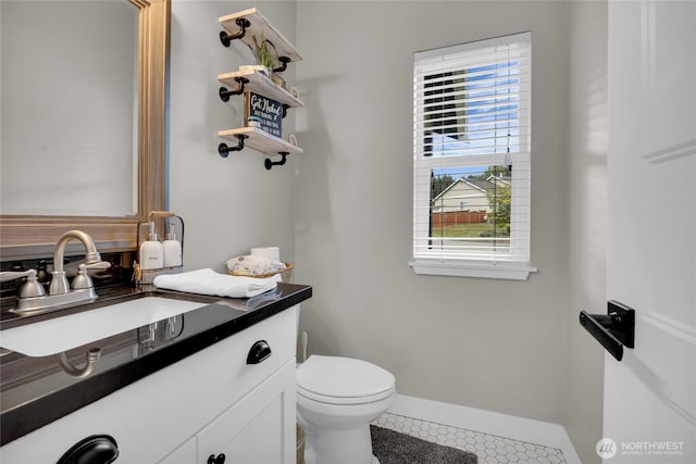 13800 27th Dr NW, Tulalip, WA 98271 - bathroom with tile patterned flooring, vanity, toilet, and baseboards
