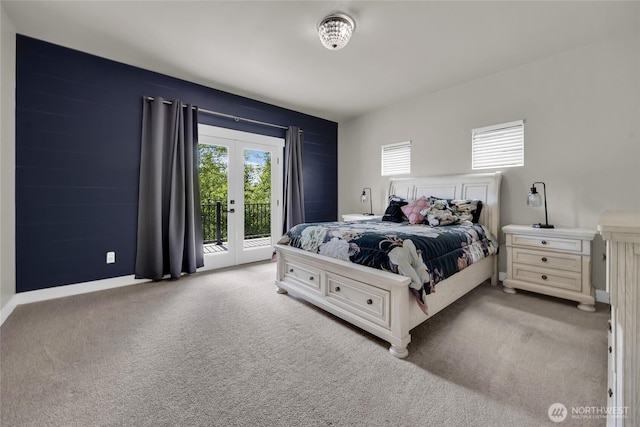 13800 27th Dr NW, Tulalip, WA 98271 - carpeted bedroom featuring access to exterior, french doors, and baseboards