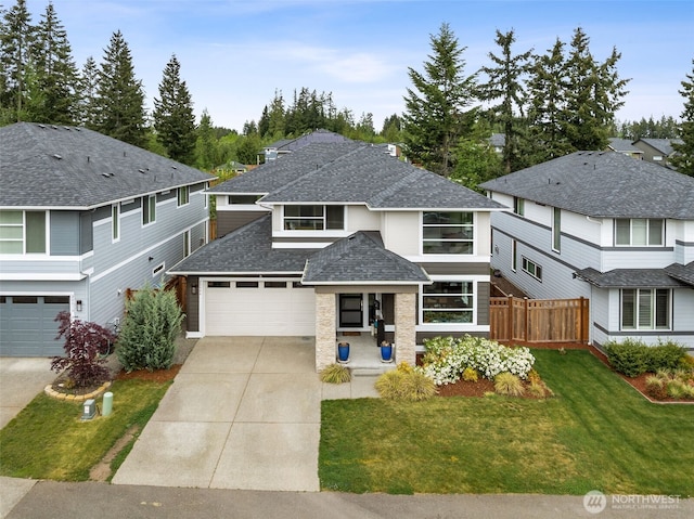 20006 149th St E, Bonney Lake, WA 98391 - traditional-style house with a shingled roof, driveway, an attached garage, and stone siding