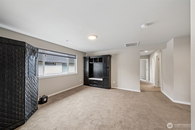 20006 149th St E, Bonney Lake, WA 98391 - spare room featuring light carpet, a smoke detector, and baseboards