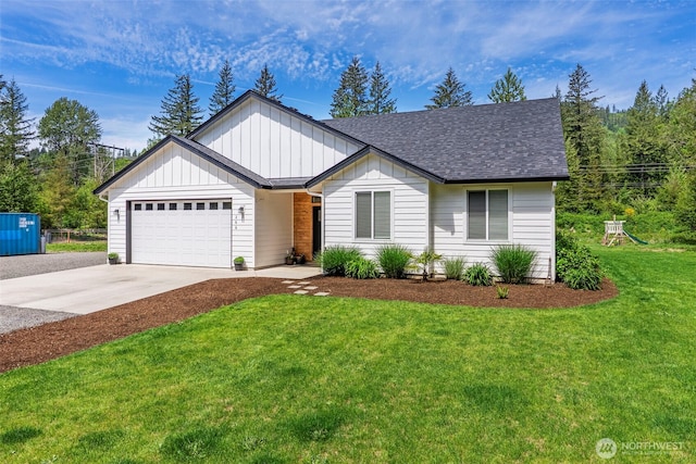 266 Fir Rd, Ariel, WA 98603 - view of front facade featuring driveway, a garage, roof with shingles, board and batten siding, and a front yard