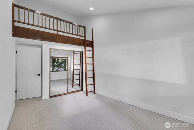 16015 Inglewood Rd NE, Kenmore, WA 98028 - unfurnished bedroom featuring baseboards, carpet floors, and recessed lighting