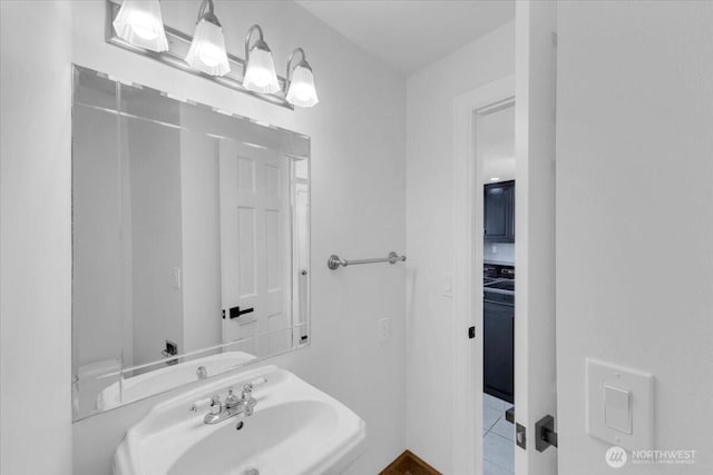 16015 Inglewood Rd NE, Kenmore, WA 98028 - bathroom featuring a sink and tile patterned floors