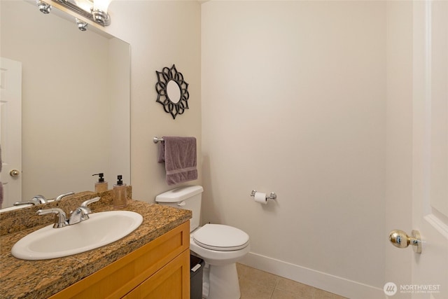 625 Argyle Ave Unit D, Friday Harbor, WA 98250 - half bath with tile patterned floors, toilet, vanity, and baseboards