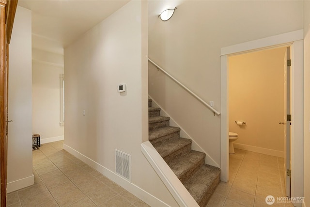 625 Argyle Ave Unit D, Friday Harbor, WA 98250 - staircase with tile patterned floors and baseboards