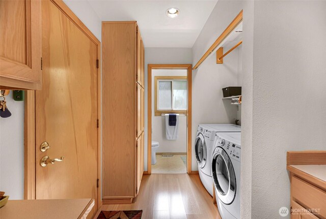 163 Polo Park Dr, Bellingham, WA 98229 - laundry room with light wood finished floors and independent washer and dryer
