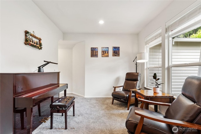 sitting room with carpet flooring, baseboards, and recessed lighting