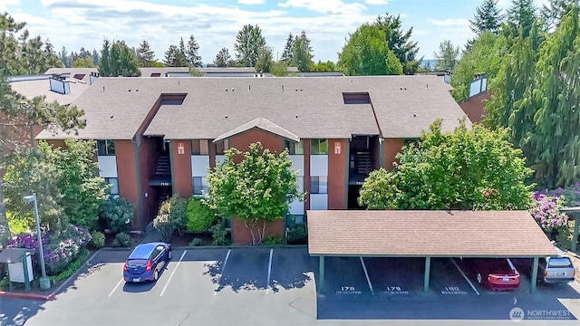 7308 N Skyview Ln Unit I-204, Tacoma, WA 98406 - view of property with uncovered parking