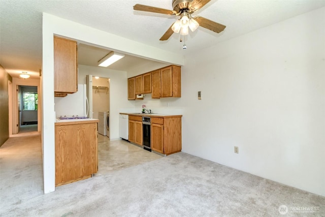 7308 N Skyview Ln Unit I-204, Tacoma, WA 98406 - kitchen with white appliances, light carpet, washer / dryer, and light countertops