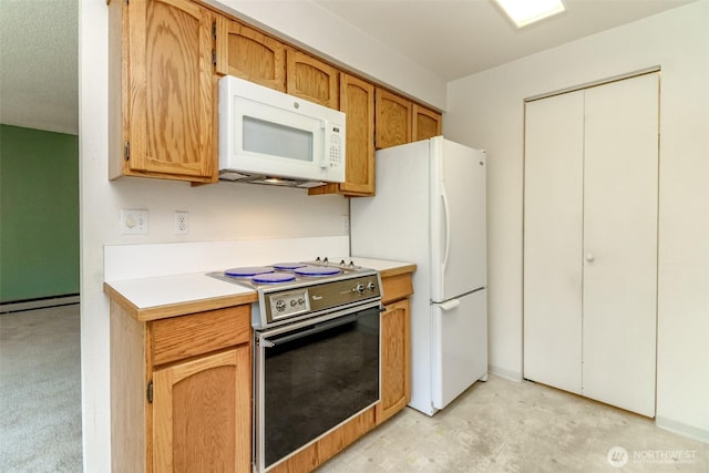 7308 N Skyview Ln Unit I-204, Tacoma, WA 98406 - kitchen featuring white appliances, light countertops, and baseboard heating