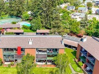 7308 N Skyview Ln Unit I-204, Tacoma, WA 98406 - drone / aerial view