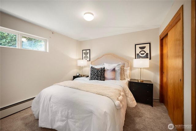 11411 Clovercrest Dr SW, Lakewood, WA 98499 - carpeted bedroom featuring a baseboard heating unit and a closet