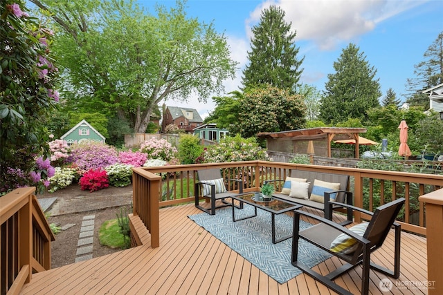 wooden deck featuring an outdoor living space