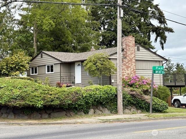 10644 19th Ave SW, Seattle, WA 98146 - view of front of home with a chimney