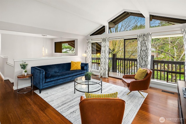 6700 81st Ave SE, Mercer Island, WA 98040 - living area with healthy amount of natural light, wood-type flooring, and baseboards