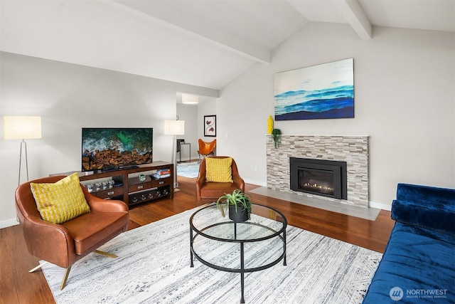 6700 81st Ave SE, Mercer Island, WA 98040 - living area featuring wood finished floors, a stone fireplace, and baseboards