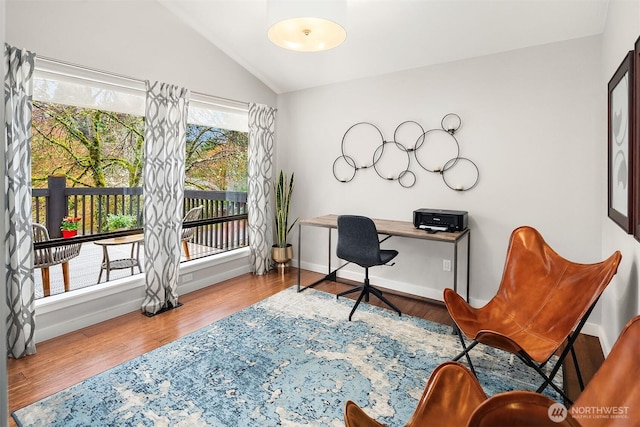 6700 81st Ave SE, Mercer Island, WA 98040 - home office with lofted ceiling, wood finished floors, and baseboards