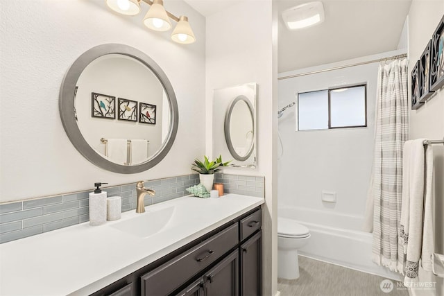 6700 81st Ave SE, Mercer Island, WA 98040 - full bath featuring toilet, shower / bath combo, vanity, and decorative backsplash