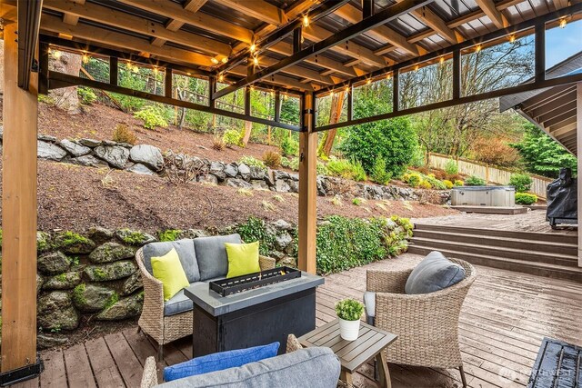 6700 81st Ave SE, Mercer Island, WA 98040 - view of patio featuring a wooden deck, a hot tub, an outdoor living space with a fire pit, and fence