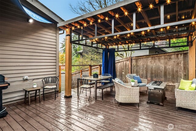 6700 81st Ave SE, Mercer Island, WA 98040 - wooden terrace with outdoor dining space and a fire pit