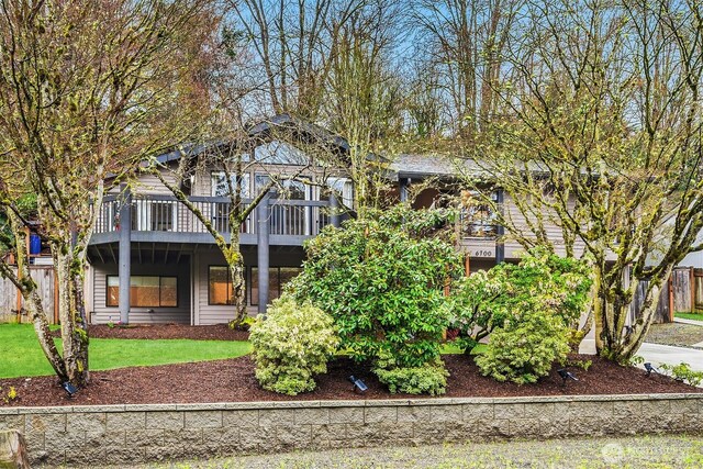 6700 81st Ave SE, Mercer Island, WA 98040 - view of front of house featuring a front lawn and a deck