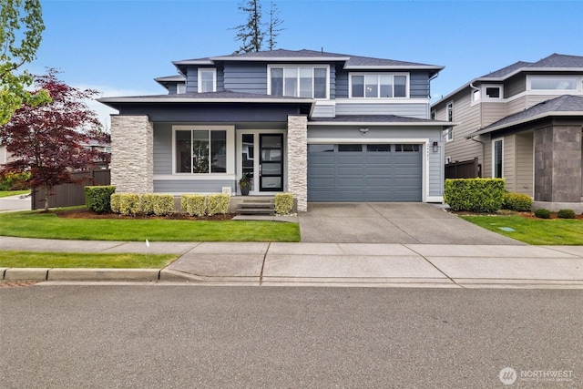 24821 237th Ln SE, Maple Valley, WA 98038 - view of front of property with driveway, an attached garage, stone siding, and roof with shingles