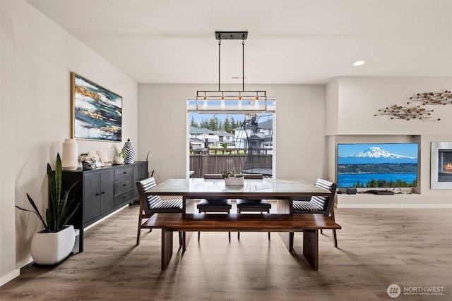 24821 237th Ln SE, Maple Valley, WA 98038 - dining room with wood finished floors, recessed lighting, and baseboards