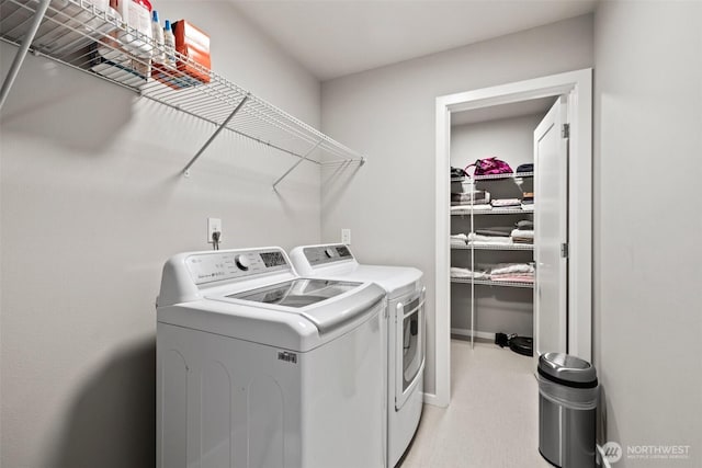 24821 237th Ln SE, Maple Valley, WA 98038 - laundry room with washing machine and clothes dryer and baseboards