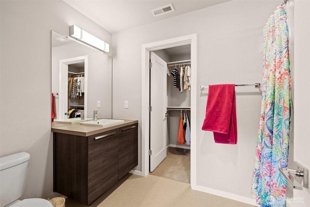 24821 237th Ln SE, Maple Valley, WA 98038 - full bath featuring vanity, a spacious closet, toilet, and baseboards