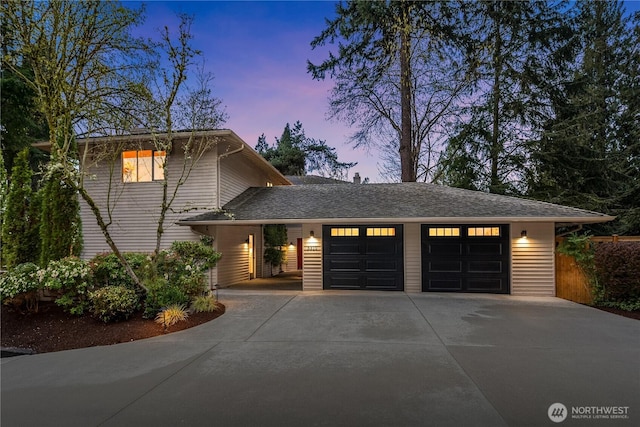 5310 W Mercer Way, Mercer Island, WA 98040 - view of front of house featuring driveway and an attached garage