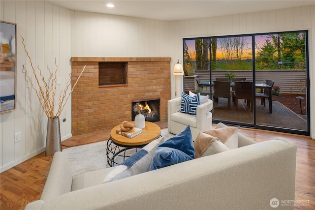 5310 W Mercer Way, Mercer Island, WA 98040 - living room featuring a brick fireplace and wood finished floors
