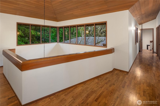 5310 W Mercer Way, Mercer Island, WA 98040 - hallway featuring vaulted ceiling, wooden ceiling, wood finished floors, and baseboards