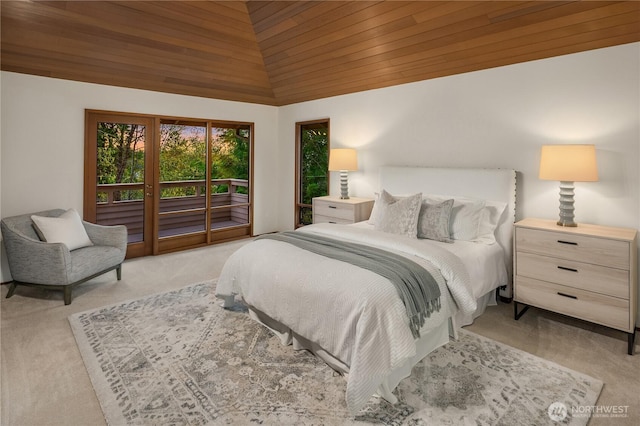 5310 W Mercer Way, Mercer Island, WA 98040 - bedroom with access to exterior, light carpet, and lofted ceiling