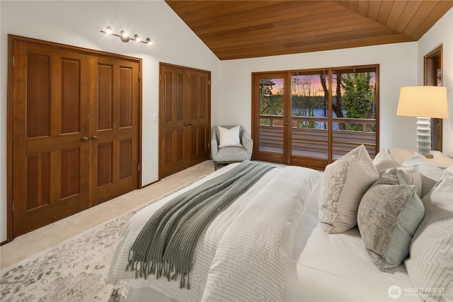 5310 W Mercer Way, Mercer Island, WA 98040 - bedroom featuring vaulted ceiling, wood ceiling, and light colored carpet