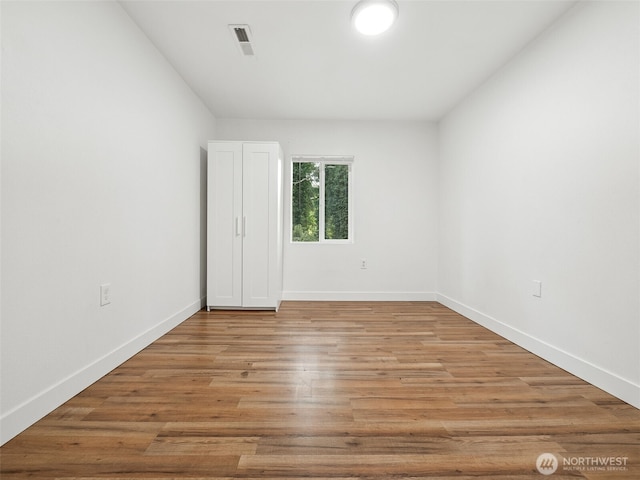 35603 Military Rd S, Auburn, WA 98001 - empty room featuring light wood-type flooring and baseboards