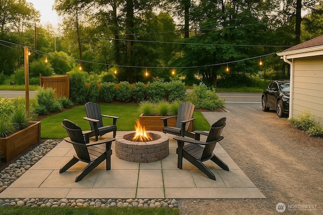 35603 Military Rd S, Auburn, WA 98001 - view of patio / terrace with an outdoor fire pit