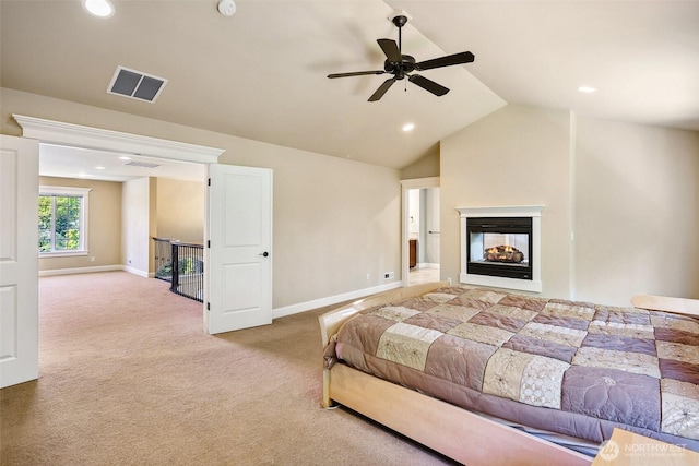 bedroom with carpet flooring, baseboards, vaulted ceiling, a multi sided fireplace, and recessed lighting